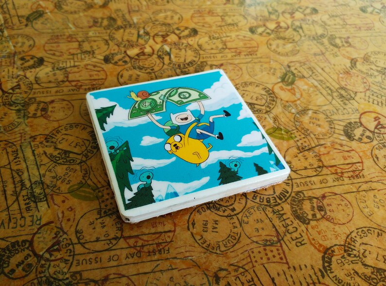 Set of 2 handmade adventure time coasters in colours green and yellow.
