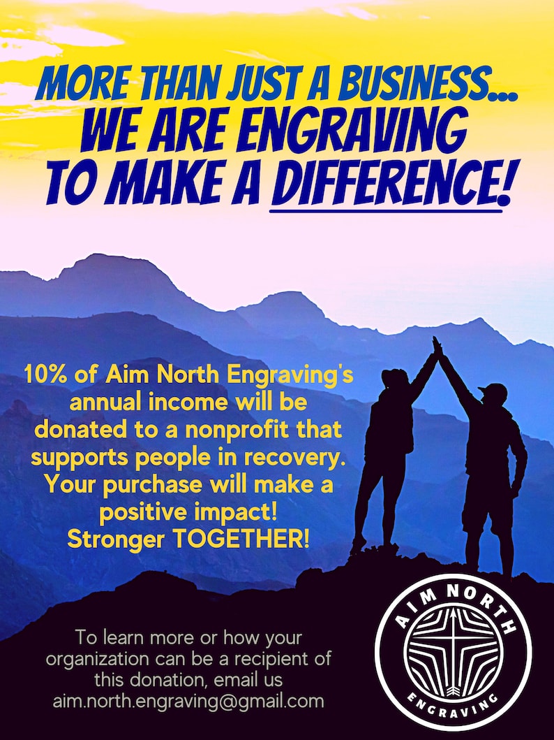 Puede incluir: Dos siluetas de personas levantando los brazos en el aire en la cima de una monta&ntilde;a contra un cielo azul con nubes amarillas. El texto "MORE THAN JUST A BUSINESS... WE ARE ENGRAVING TO MAKE A DIFFERENCE!" est&aacute; en la parte superior de la imagen. El texto "10% of Aim North Engraving's annual income will be donated to a nonprofit that supports people in recovery. Your purchase will make a positive impact! Stronger TOGETHER!" est&aacute; en el medio de la imagen. El texto "To learn more or how your organization can be a recipient of this donation, email us aim.north.engraving@gmail.com" est&aacute; en la parte inferior de la imagen. Un logotipo de Aim North Engraving est&aacute; en la esquina inferior derecha de la imagen.