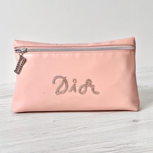 DIOR BEAUTE コスメティック トイレタリー ポーチ バッグ グリッター ロゴ フランス C800200092 クリスチャン パルファム ライトピンク色