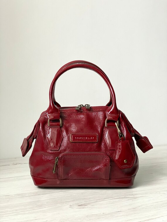 Vintage Longchamp bag, Fuseau model, cowhide leather in dark fuchsia /  burgundy tones Silvery Fuschia ref.129629 - Joli Closet