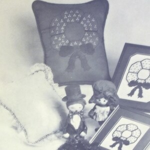 Folleto con patrones de punto de cruz y guirnalda de velas