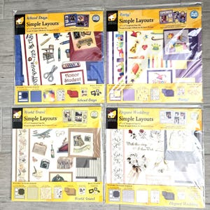 May include: Four scrapbook page kits: "School Days", "Party!", "World Travel", and "Elegant Wedding". Each kit includes 12" x 12" scrapbook pages and decorative elements. The "School Days" kit features school-themed graphics.