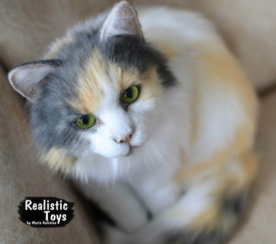 lifelike stuffed cat