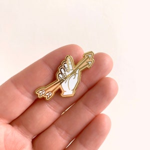 Quiver, Enamel Pin