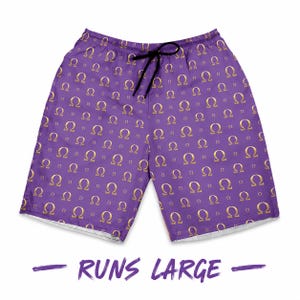May include: Purple shorts featuring a repeating gold Omega symbol pattern throughout the fabric. The shorts include a black drawstring at the elastic waistband. Below the shorts, the text RUNS LARGE is printed in purple capital letters.