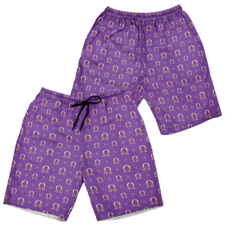 May include: A pair of purple shorts featuring an all-over repeating pattern of gold-colored Greek omega symbols. The shorts have an elastic waistband with a black drawstring cord centered at the front for an adjustable fit and a loose leg cut.