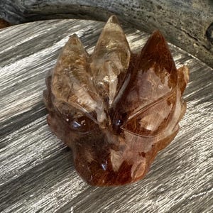 Smoky Rutile Dragon Skull Carving: Leandro de Souza Palm Stone
