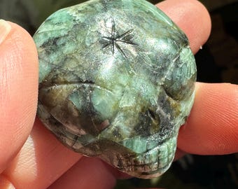 Leandro De Souza Adorable Alien Emerald Palm Crystal Skull