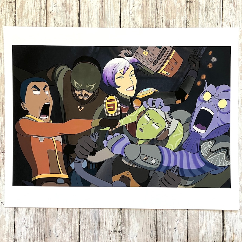 May include: A group of five cartoon characters in a chaotic scene. A green character with a headband is in the center, surrounded by a purple character with a large mouth, a blue character with a green headband, a green character with a red headband, and a purple character with a red headband.
