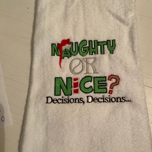 Embroidered hand towel naught or nice Christmas decor