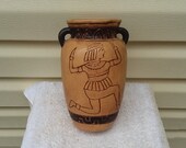 Vintage Pottery Vase with Human on Front and Jars on Back