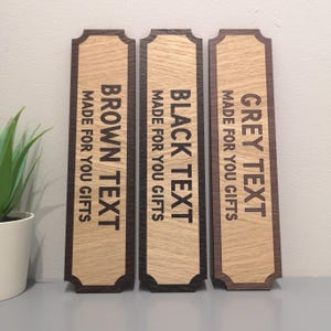 May include: Three wooden signs with a brown border and rounded edges. The signs have the text "GREY TEXT MADE FOR YOU GIFTS", "BLACK TEXT MADE FOR YOU GIFTS", and "BROWN TEXT MADE FOR YOU GIFTS" in black, brown, and grey text respectively.