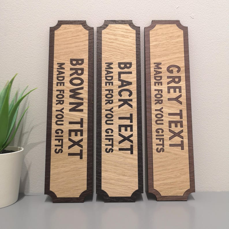 May include: Three wooden signs with a brown border and rounded edges. The signs have the text "GREY TEXT MADE FOR YOU GIFTS", "BLACK TEXT MADE FOR YOU GIFTS", and "BROWN TEXT MADE FOR YOU GIFTS" in black, brown, and grey text respectively.