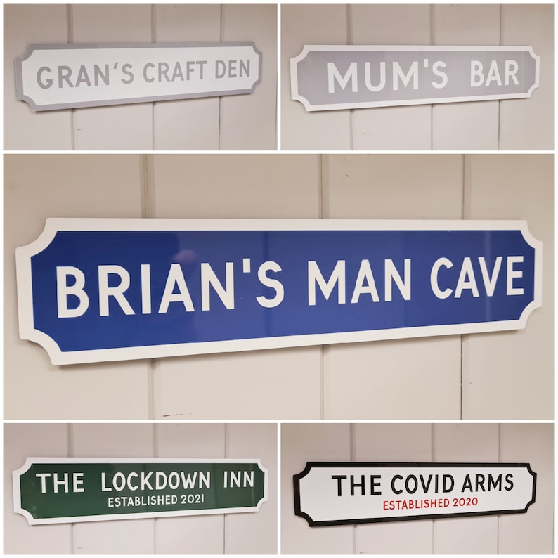 May include: Four decorative signs with white text on a colored background. The signs read "Gran's Craft Den", "Mum's Bar", "Brian's Man Cave", "The Lockdown Inn Established 2021", and "The Covid Arms Established 2020".