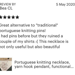 May include: A silver knitting needle necklace with a decorative swirl design. The necklace is a functional alternative to traditional knitting needles. The product description reads "Portuguese knitting necklace, yarn hook pendant, functional..."