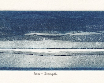 May include: A blue and white abstract seascape print with the text "Sea-Scape" and "7/25" in the bottom corners. The print is a limited edition of 25.