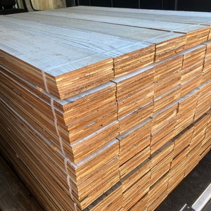 Reclaimed wood paneling “white washed”