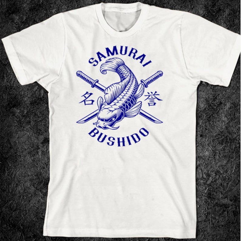 May include: White t-shirt with a blue graphic design of a koi fish with crossed swords and the text "SAMURAI BUSHIDO" in a circle. The text "名" and "誉" are also included in the design.