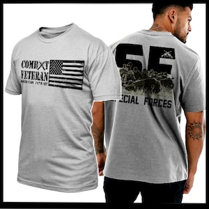 May include: Gray t-shirt with the text "Combat Veteran American Patriot" and an American flag graphic on the front. The back of the shirt has the text "Special Forces" and a graphic of soldiers in a military vehicle.