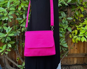Pink Iris Crossbody Bag, Waterproof Canvas, Print interior, Simple, yet elegant with adjustable strap and interior zipper pocket.