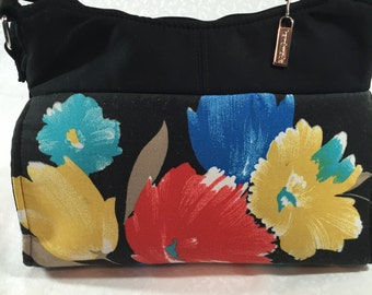 Flowers Galore in this sassy "Gabby Bag", with a zippered top and adjustable shoulder, crossbody strap