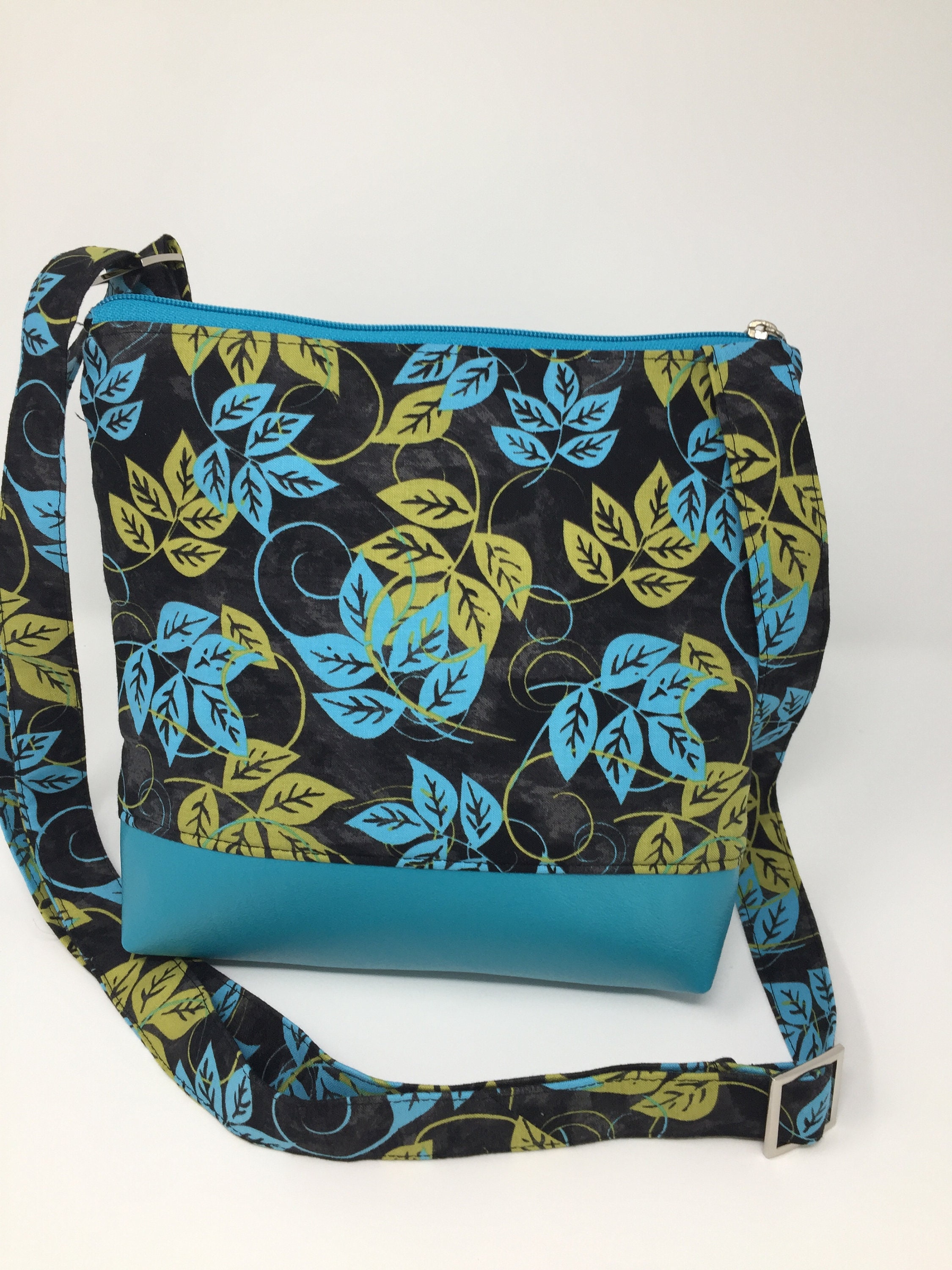 Turquoise black and green Crossbody bag, Two zip hipster, Exterior
