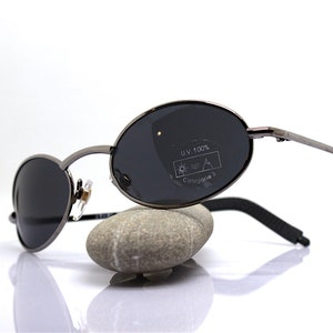 Ovale zonnebril man gunmetal frame wrap steampunk matrix vertederend, ovale herenzonnebril in boeiend grijs omhullend metaal