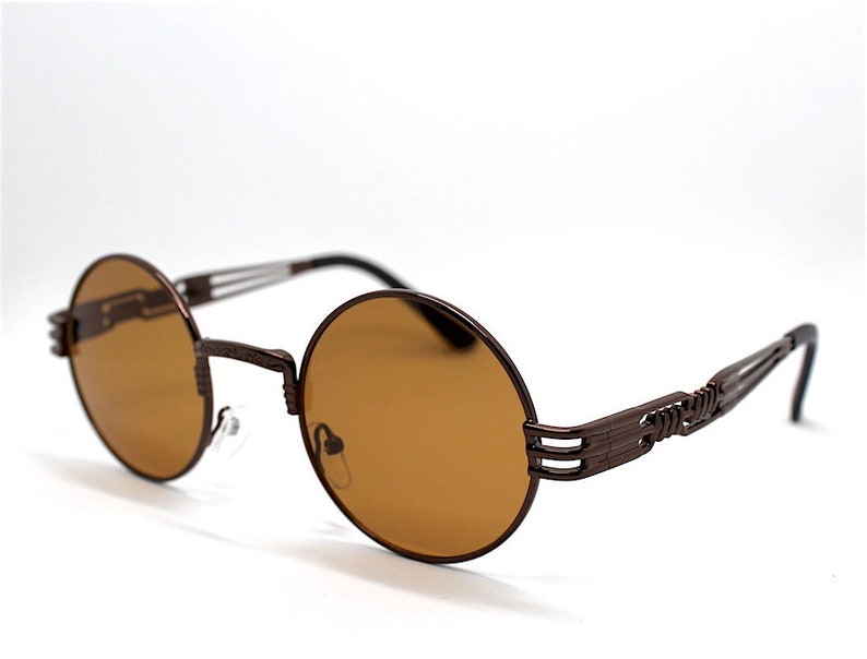 Occhiali da sole uomo donna rotondo bronzo lente marrone Round s Occhiali da sole uomo donna rotondo bronzo lente marrone Round s