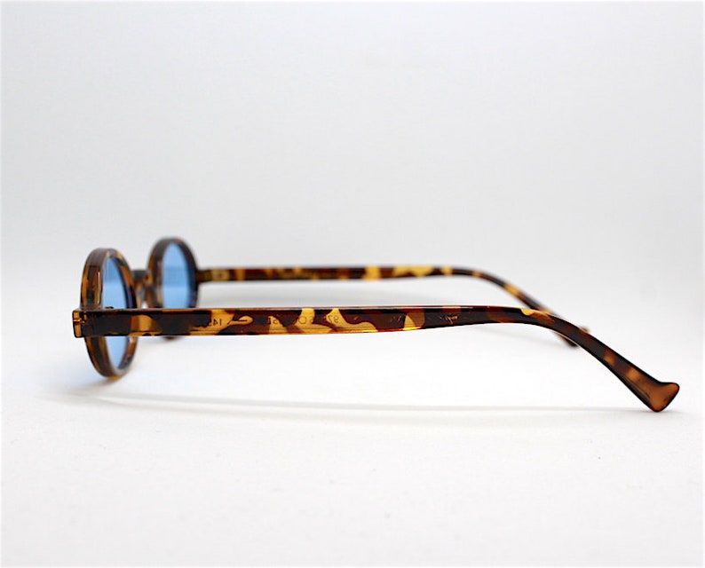 Occhiali da vista ovali Tura vintage montatura per occhiali in argento montature per occhiali usate retrò unisex da uomo da donna - Italia