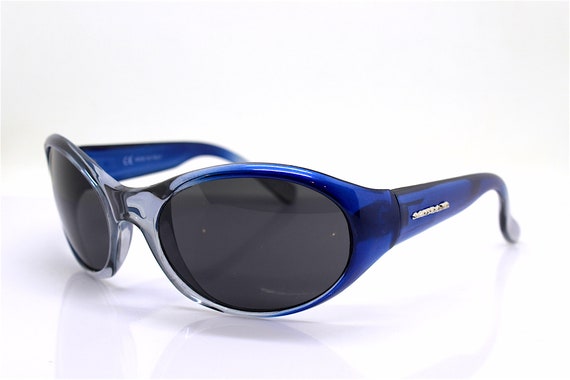 MADE IN ITALY Wrap Oval Snug Sunglasses Man Transparent  display picture 1