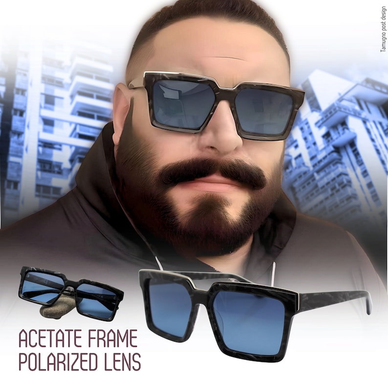 May include: A pair of black acetate sunglasses with polarized lenses. The sunglasses have a square frame with a marble-like pattern. The lenses are blue.