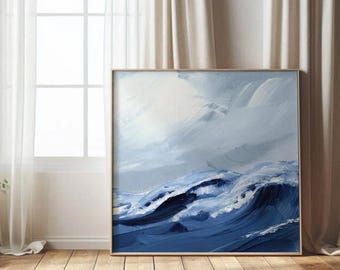 May include: Abstract ocean wave painting in shades of blue and white, framed in a light wood. The artwork depicts dynamic brushstrokes, evoking a sense of movement and the power of the sea. The painting is displayed against a neutral background.