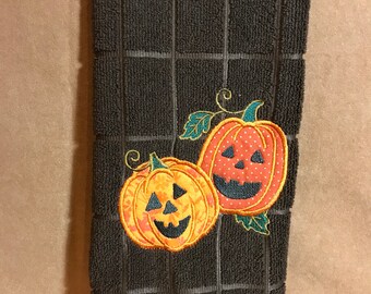 Kitchen towel with appliquéd pumpkins