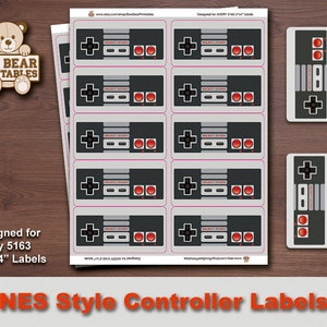 May include: Printable labels designed for Avery 5163, 2" x 4" labels, featuring a retro NES style game controller with a gray and black design. The labels have red and black buttons and a pink border.