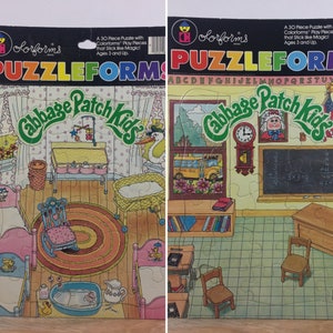 May include: A 30-piece puzzle featuring a Cabbage Patch Kids themed classroom scene. The puzzle pieces are colorforms that stick like magic. The puzzle is recommended for ages 3 and up.