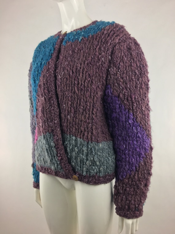 Loose-fitting striped color-blocked knit sweater