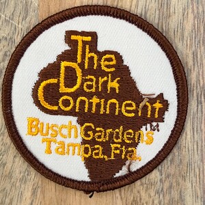 ヴィンテージ ダークコンチネント ブッシュガーデンズ スーベニアパッチ 旅行記念品 刺繍 縫い付け コレクタブル ツーリストバッジ ジャケット ベスト バックパック NOS