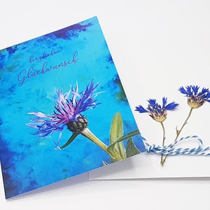 Geburtstagskarte Sommer, farbenfrohe Gratulation für Sommerkinder, Fotocollage abstraktes Bild mit Kornblume