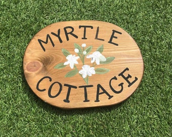 Hand Painted Wooden House Sign: Oval White Flower Cottage Plaque
