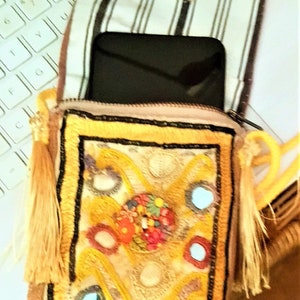 Embroidered Indian fabric with mirrors and tassels, made into a crossbody phone bag for a 6&quot; X 3&quot; phone