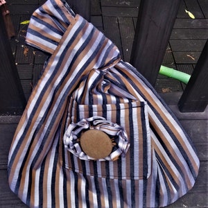 Striped silk Japanese knot bag, wrist bag, evening bag, flower embellished: reversible with plain shiny silver fabric on the other side