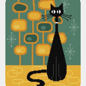 May include: A black cat with a white collar sits in front of a teal and yellow geometric pattern. The cat is facing to the right and has its tail curled behind it.
