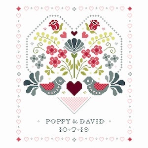 May include: Cross-stitch design featuring two birds facing each other, a heart, flowers, and the names "POPPY & DAVID" with the date "10-7-19". The design is framed with hearts and diamond shapes, in shades of red, pink, gray, and green.