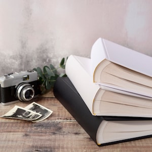 SLIGHT SECONDS - Large Traditional Book Bound Plain Photograph Album with opaque glassine interleaves. 30x31xms 50 pages/100 sides DIY album
