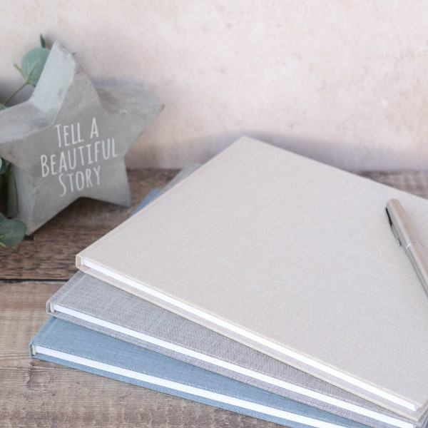 SLIGHT SECONDS - Linen Guest Book. Plain DIY Guest Book available in Natural, Grey, Blue or Sand Grey Linen. 50 pages / 100 sides.
