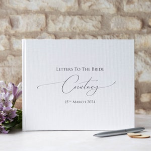 Libro de firmas personalizado de alta calidad "Cartas a la Novia". Elegante diseño con texto manuscrito. 50 páginas blancas lisas / 100 caras. 13 colores.