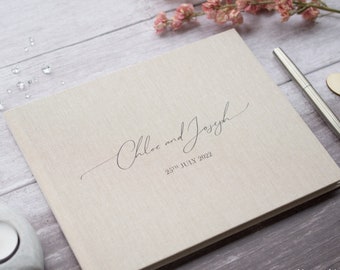 Personalised Wedding Guest Book. Simple elegant text design. 13 book colour options. Wedding gift / keepsake. Option to add Guest Book Sign.