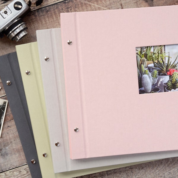 High Quality Linen Screw Bound Expandable Photograph Album with opaque glassine interleaves. 39x31cms. 20 pages / 40 sides. 4 colour choices