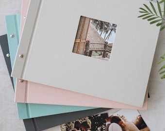 High Quality Linen Screw Bound Expandable Photograph Album with opaque glassine interleaves. 39x31cms. 20 pages / 40 sides. 4 colour choices