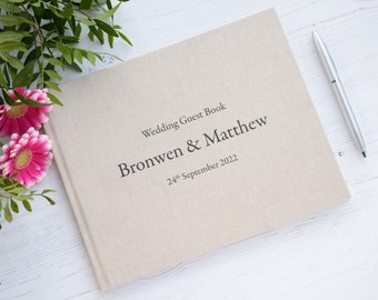 Personalised High Quality Wedding Guest Book.  Simple classy text design. 50 plain white pages / 100 sides. 13 book colour choices.